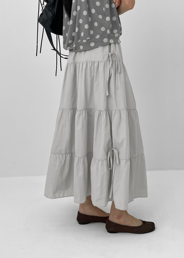 Kyoryong Ribbon Tiered Long Skirt