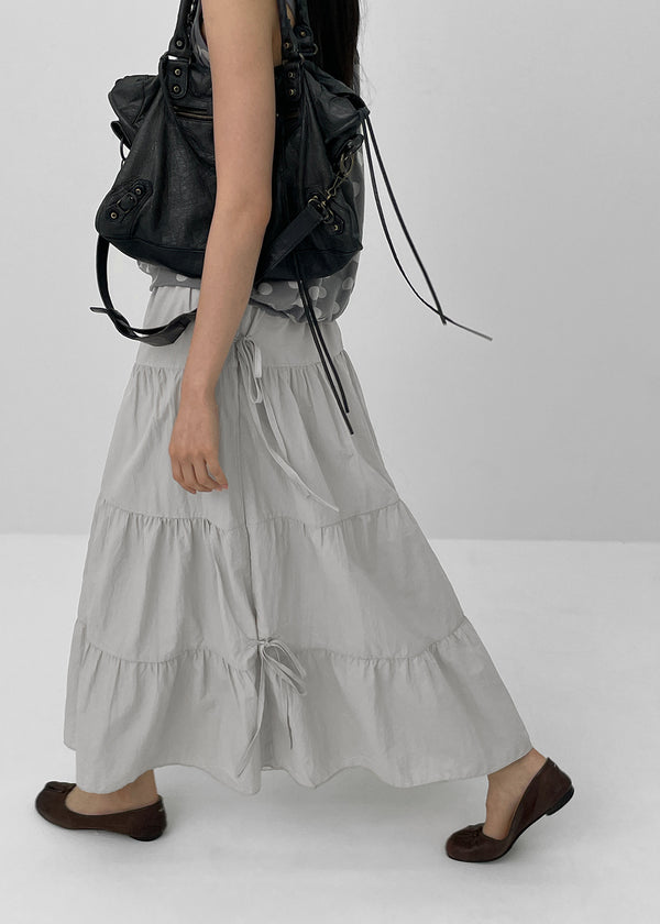 Kyoryong Ribbon Tiered Long Skirt