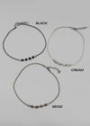 Le Coup Ethnic Mini Ball String Necklace