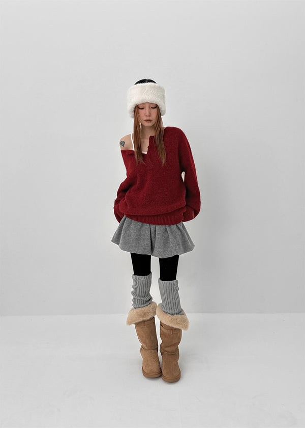 Kaeno Loose-fit Wool Henley Neck Knit