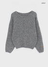 Kaeno Loose-fit Wool Henley Neck Knit