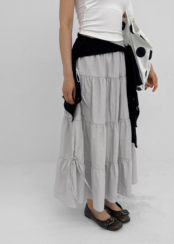 Kyoryong Ribbon Tiered Long Skirt