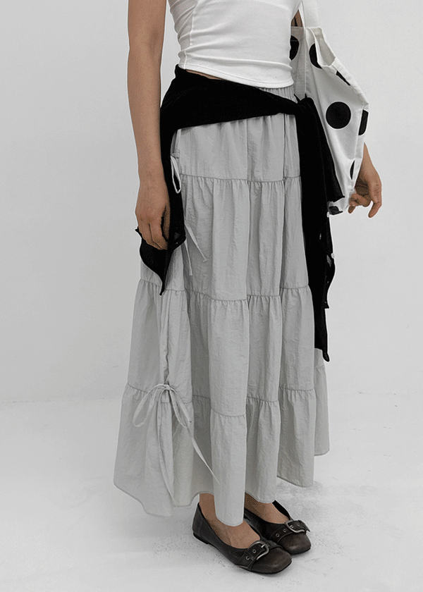 Kyoryong Ribbon Tiered Long Skirt