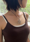 Coffs flower pendant string necklace
