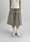 Parane Banding Pleated Midi Skirt