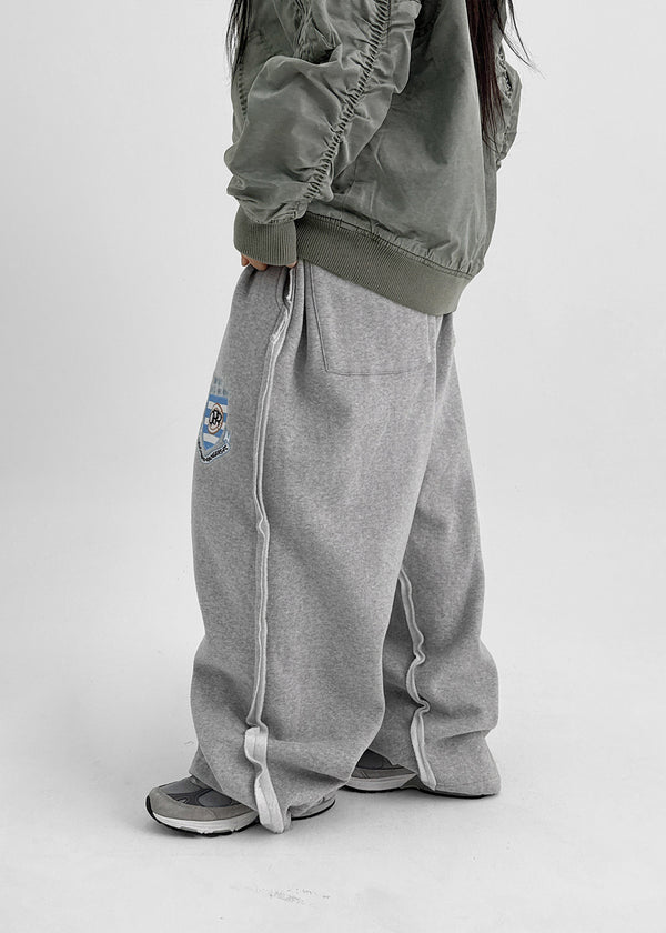 (UNISEX) Serban Sheepskin Embroidered Two-way Banding Pants