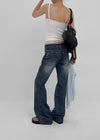 Felser Washed Riveted Low-waist Bootcut Denim Pants