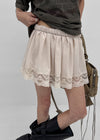 Nellie's satin lace miniskirt