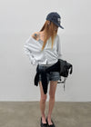 Slant V-neck knit cardigan