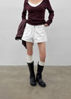 Overt studded cotton shorts