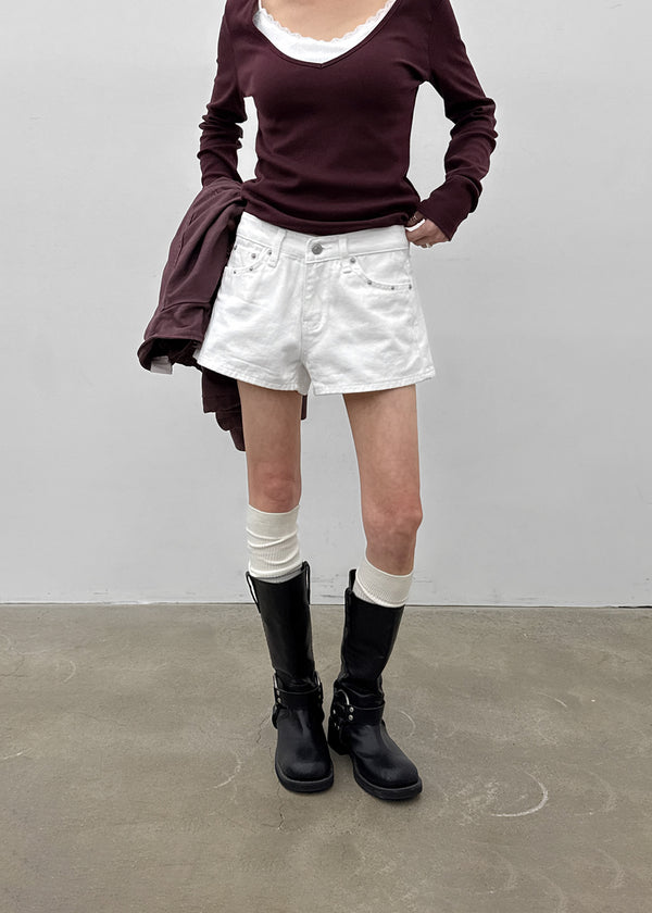 Overt studded cotton shorts