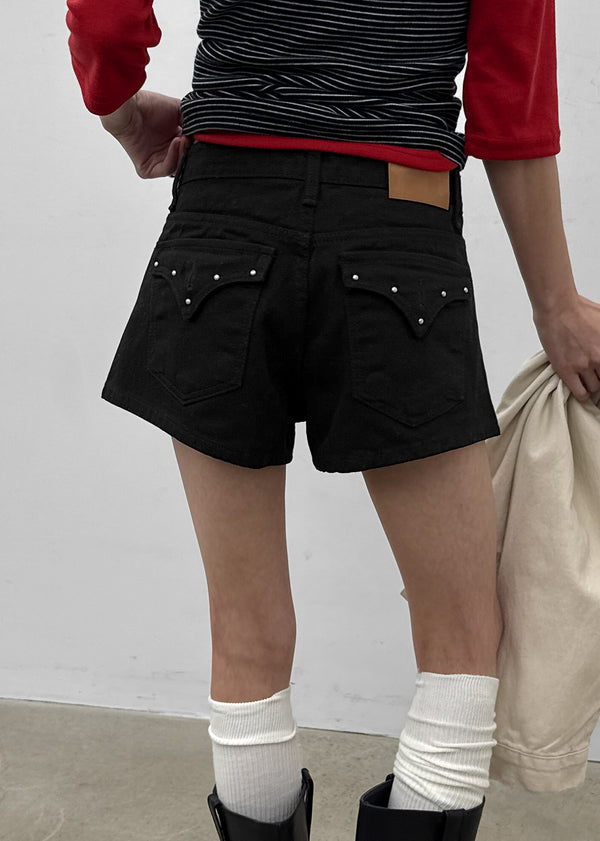 Overt studded cotton shorts