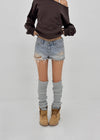 Cheeky distressed denim shorts