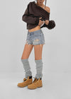 Cheeky distressed denim shorts