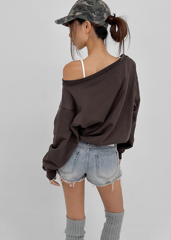Cheeky distressed denim shorts