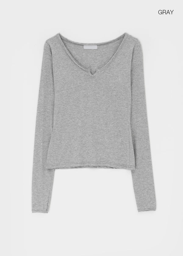Genie Cutout Slit Neck Long Sleeve Tee