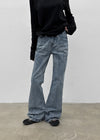 Arch low-waist bootcut denim pants