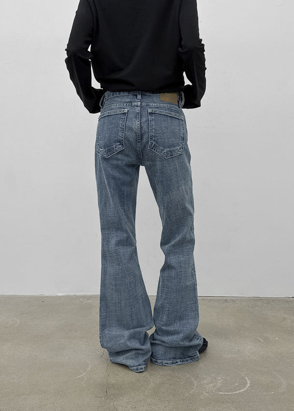 Arch low-waist bootcut denim pants