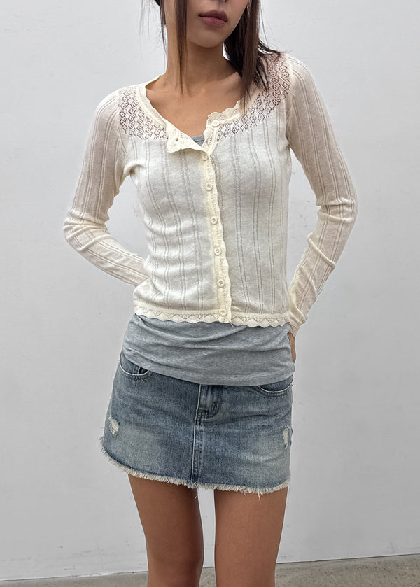 Skirt punched wool knit cardigan