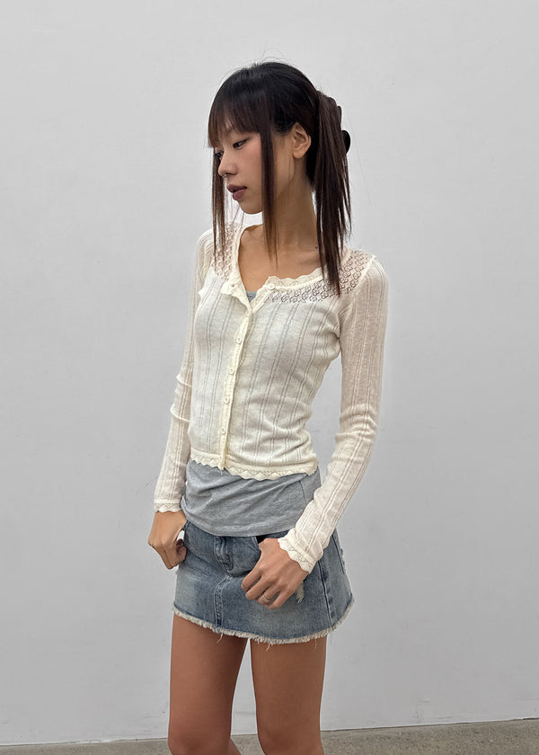 Skirt punched wool knit cardigan