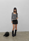 Skirt punched wool knit cardigan