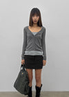 Skirt punched wool knit cardigan