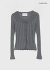 Skirt punched wool knit cardigan