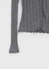 Skirt punched wool knit cardigan
