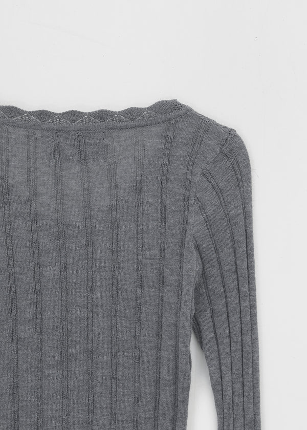 Skirt punched wool knit cardigan