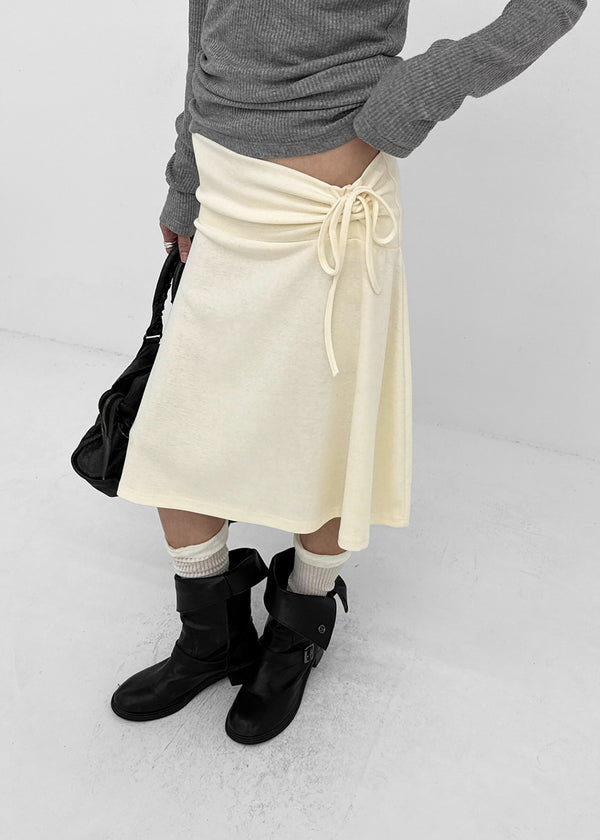 Ana-kick shirred flare midi skirt
