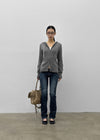 Uncut low-waist distressed skinny denim pants