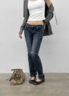 Uncut low-waist distressed skinny denim pants