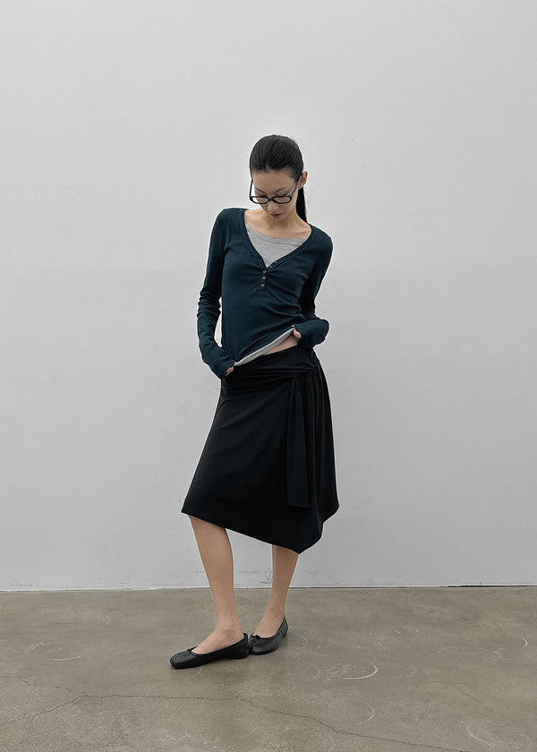 Pyamang asymmetrical wrap midi skirt