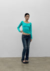 Uncut low-waist distressed skinny denim pants