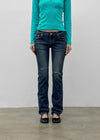 Uncut low-waist distressed skinny denim pants