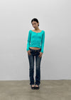 Uncut low-waist distressed skinny denim pants