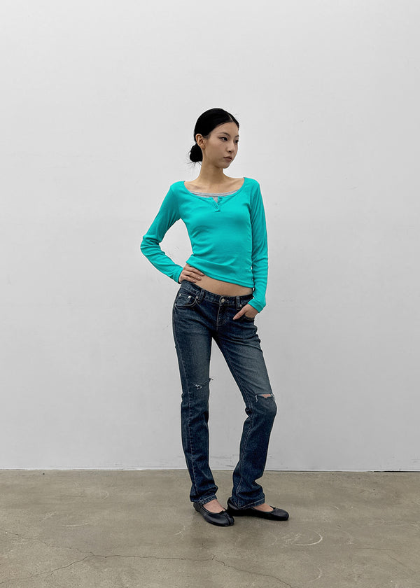 Uncut low-waist distressed skinny denim pants