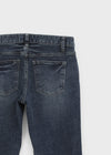Uncut low-waist distressed skinny denim pants