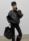 Formless high-neck leather jumper