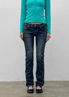 Uncut low-waist distressed skinny denim pants