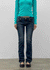 Uncut low-waist distressed skinny denim pants