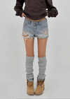 Cheeky distressed denim shorts