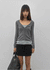 Skirt punched wool knit cardigan